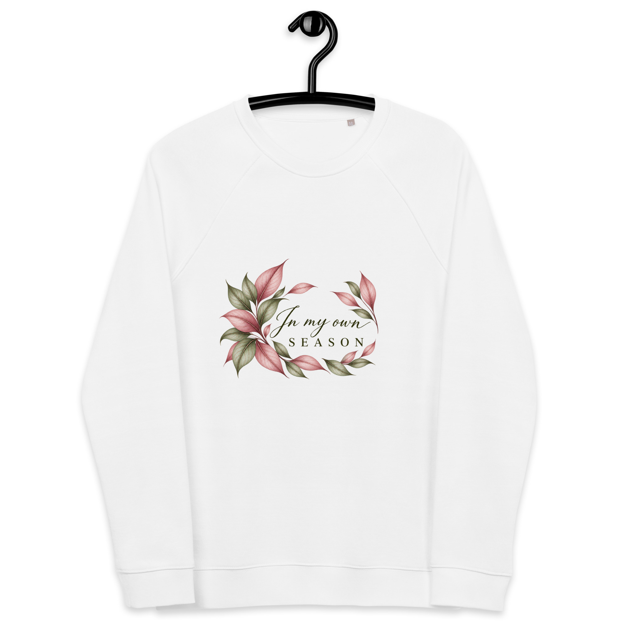 In My Own Season organic raglan sweatshirt in white with a rose and sage botanical wreath, front view