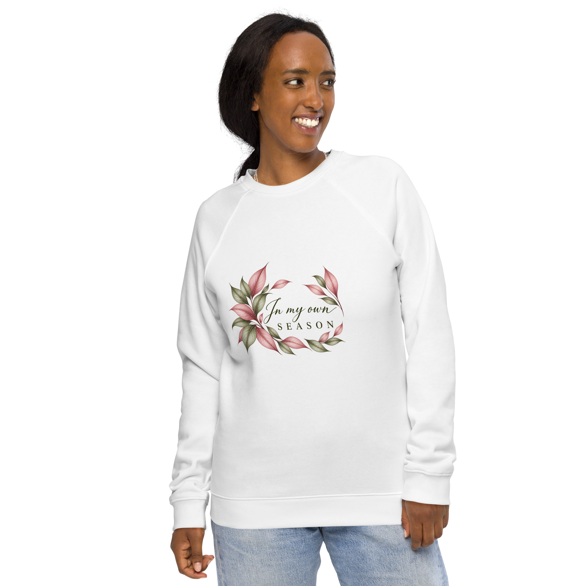 In My Own Season organic raglan sweatshirt in white with a rose and sage botanical wreath, front view