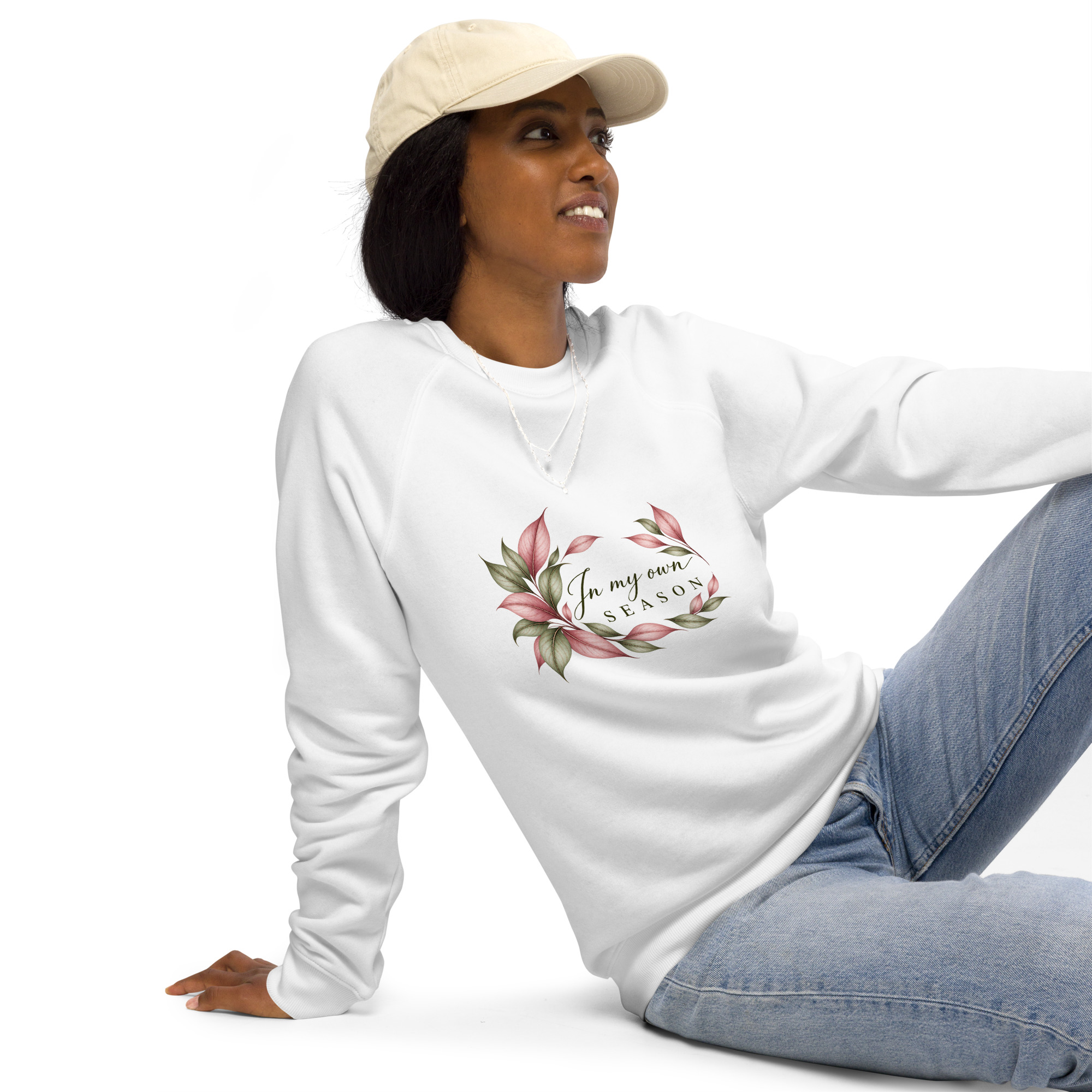 In My Own Season organic raglan sweatshirt in white with a rose and sage botanical wreath, front view