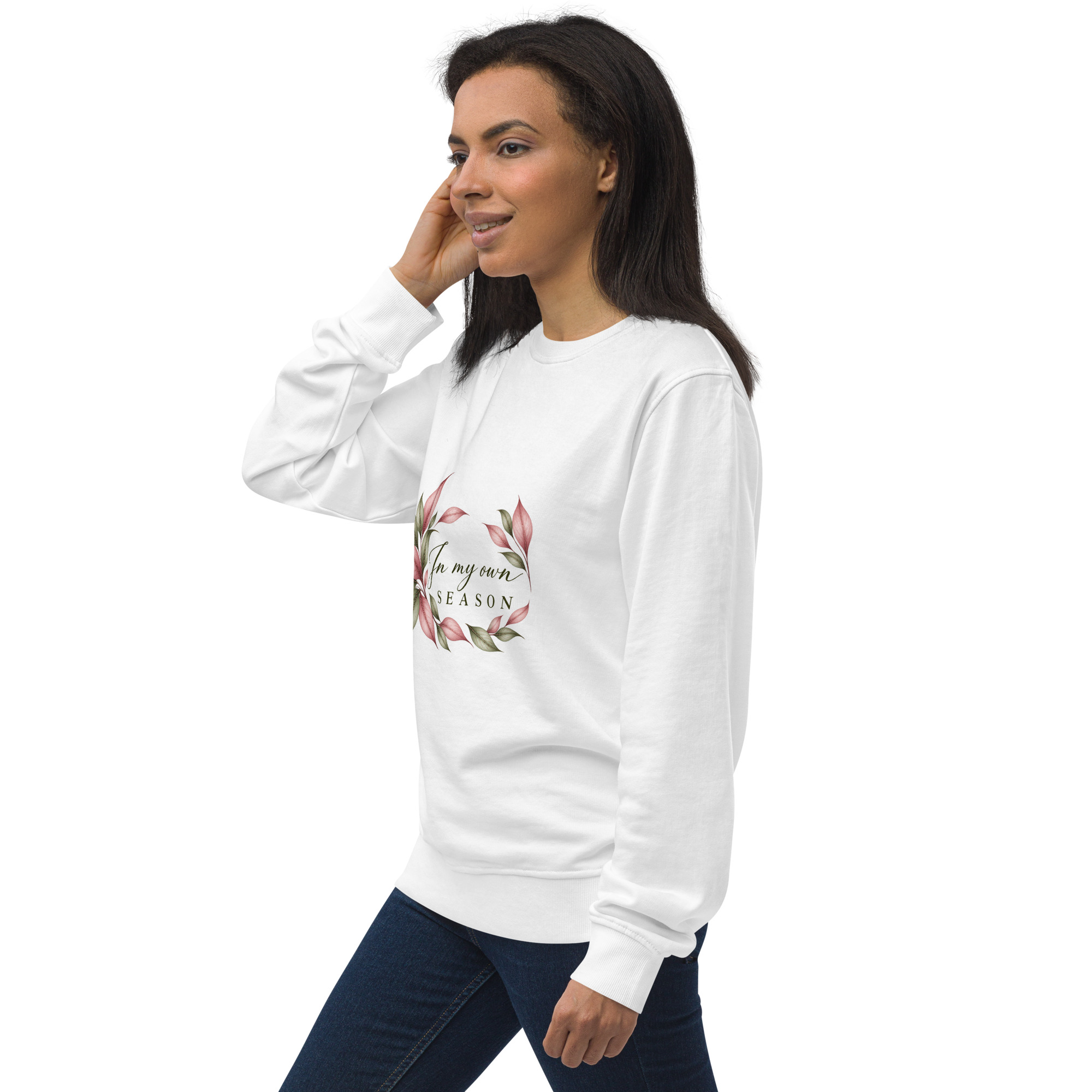 In My Own Season organic crewneck sweatshirt in white with a rose and sage botanical wreath, left side view
